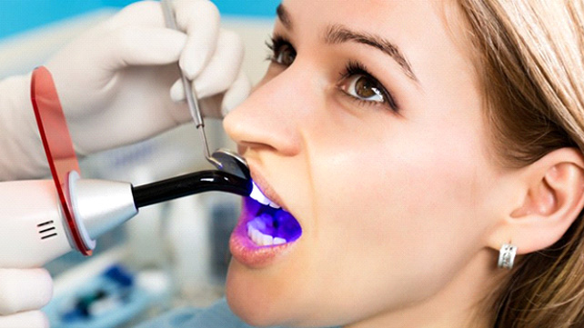 Dental patient receiving direct bonding in Colchester