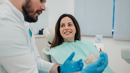 Woman smiling in the dental chair