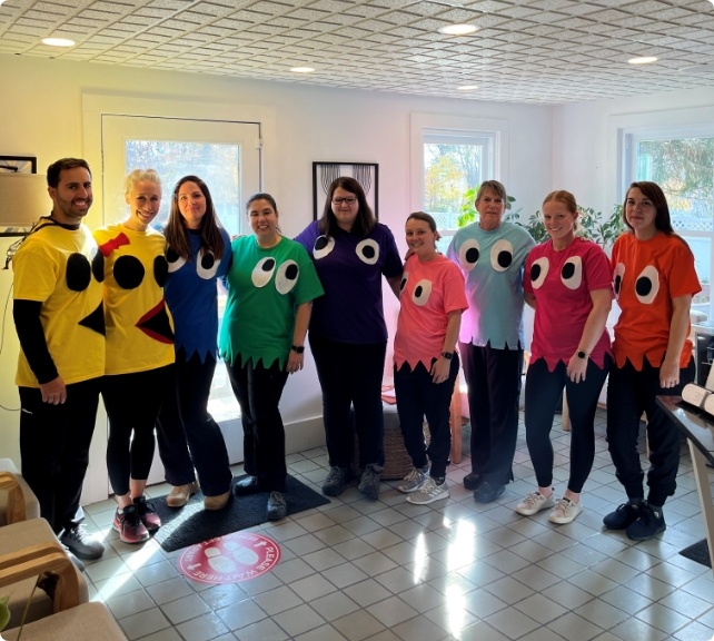 Elevate Dental team wearing Pac Man costumes