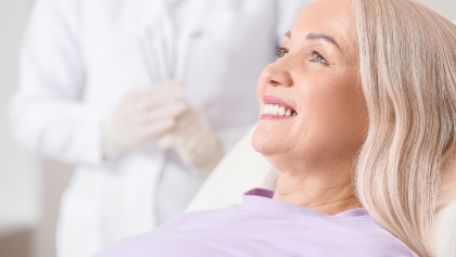 Woman relaxing during dental implant appointment