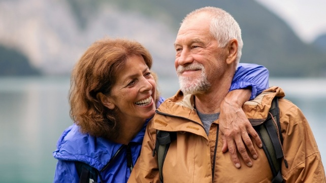 Older couple enjoying the benefits of dental implants