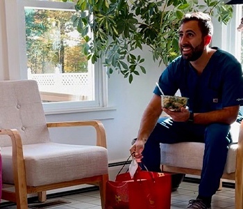 Smiling dental team member in treatment room