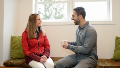 Dentist and patient discussing dental insurance coverage for Invisalign