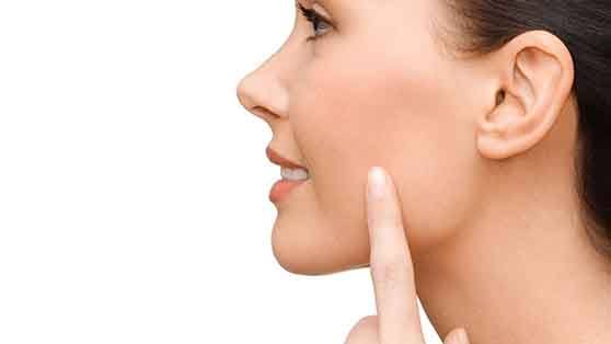 Profile of woman with slim, defined jawline