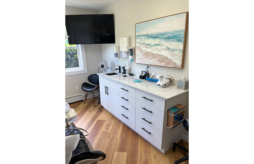 Table with sink and dental tools in dental treatment room