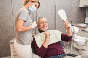 man talking to dentist 