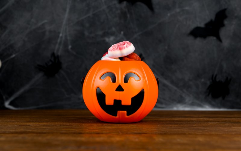 Spooky Orange Bowl Full of Halloween Candy